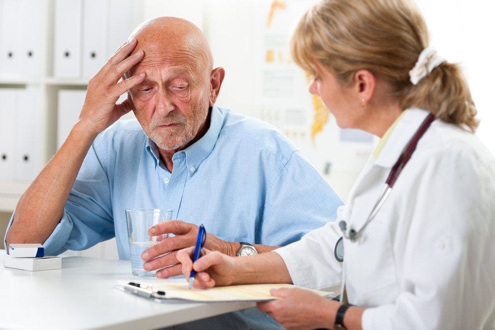 elderly older man patient physician interview
